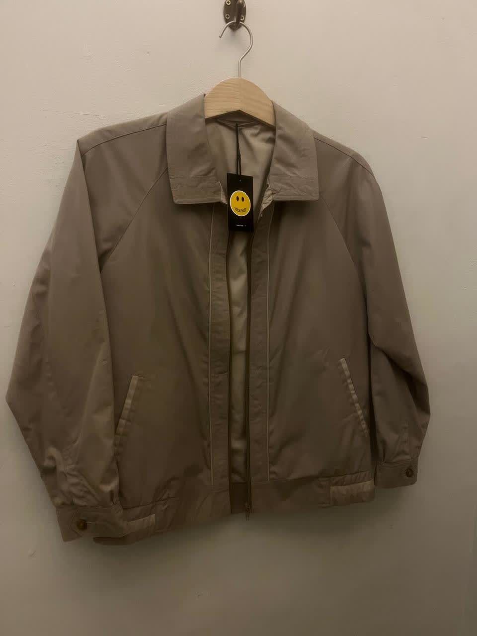 Taupe Harrington — preloved outerwear on the rail at Lola's Street Thrifts, Observatory
